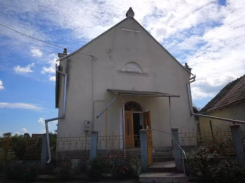 Biserica Baptistă, Tău